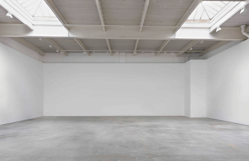 Animated gif of the interior space at 519 West 19th Street in New York, and featuring the exhibition Luc Tuymans: The Summer Is Over (dated 2013), and the exhibition Tomma Abts (dated 2014).