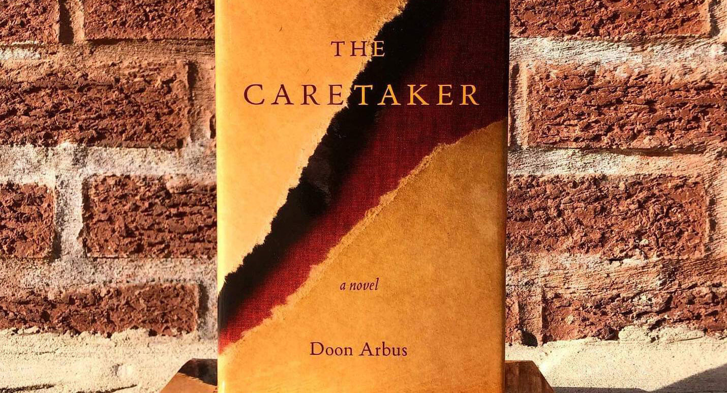 A photo of a book by Doon Arbus, titled The Caretaker, published in 2020.