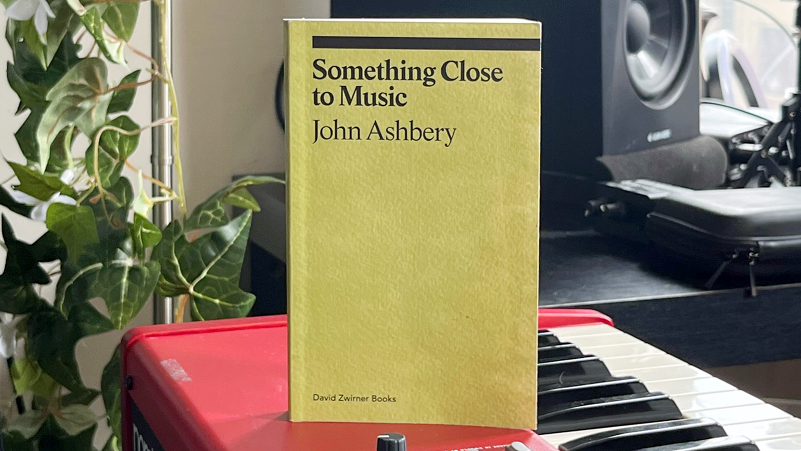 A photo of a book by John Ashbery, titled Something Close to Music: Late Art Writings, Poems, and Playlists, published by David Zwirner Books in 2022.
