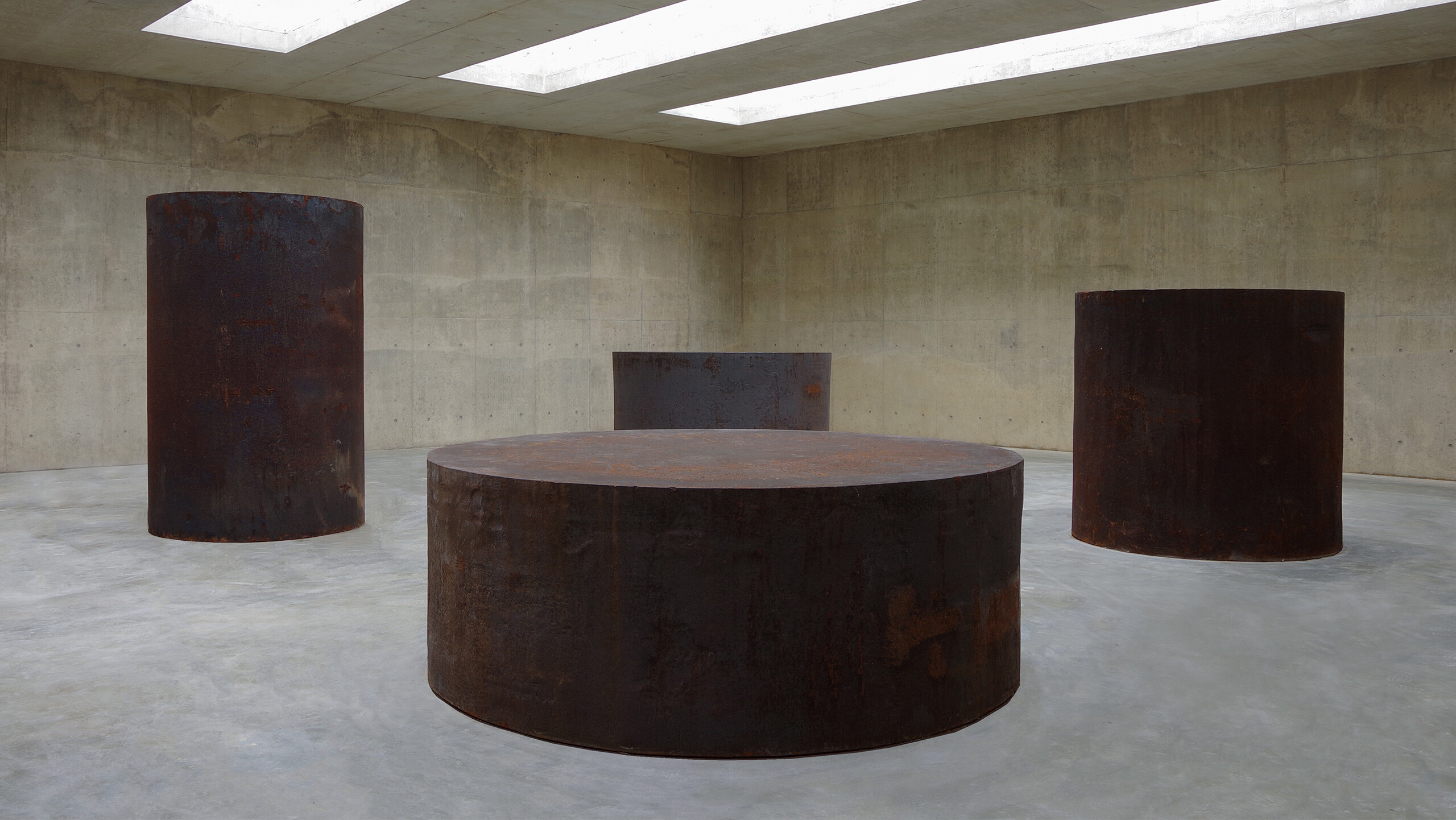 Sculptures by Richard Serra, titled Four Rounds: Equal Weight, Unequal Measure, dated 2017.