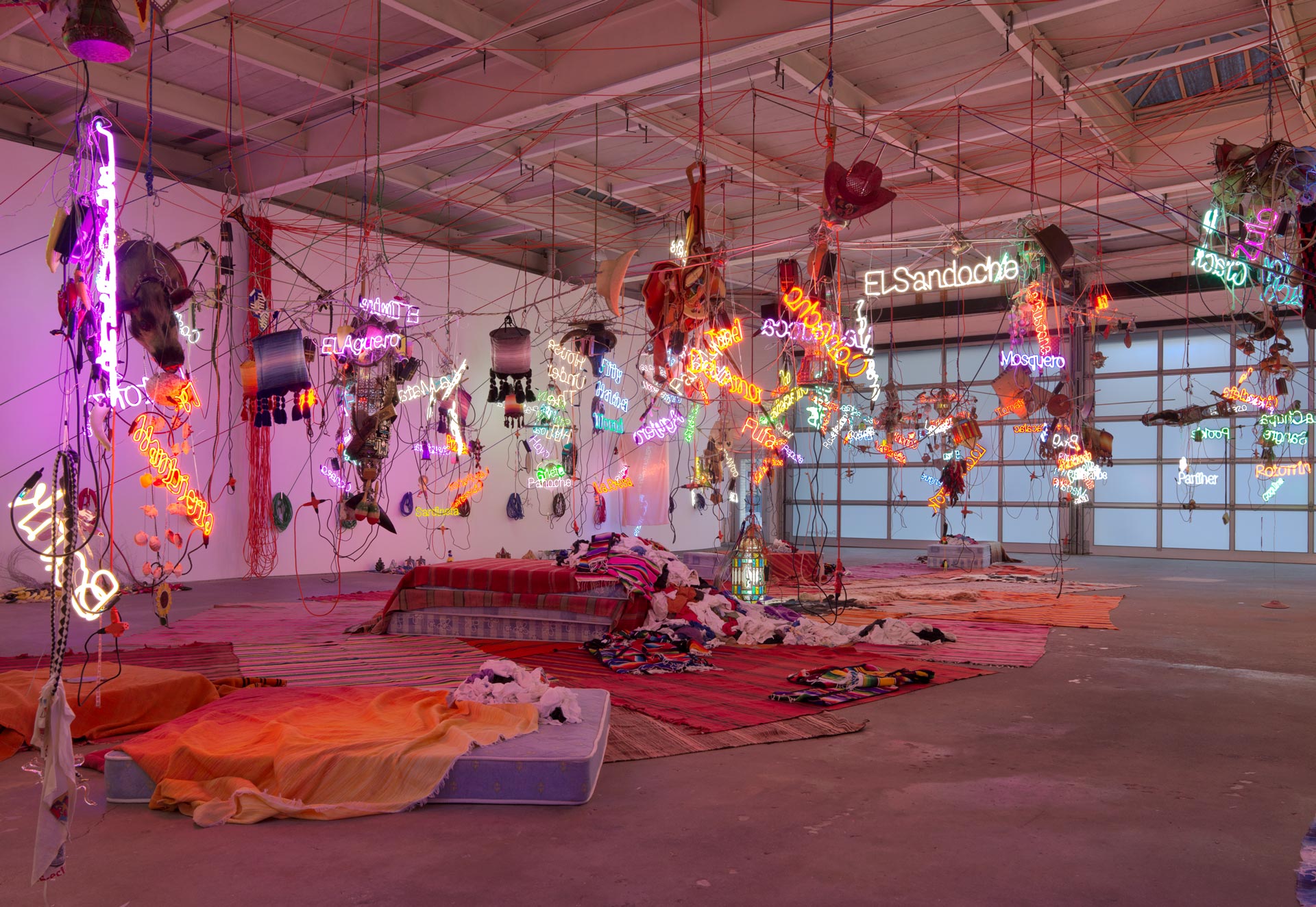 Installation view of the exhibition, Jason Rhoades: Tijuanatanjierchandelier, at David Zwirner in New York, dated 2019.